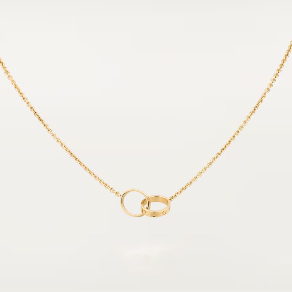 Cartier Gold Interlocking Ring Pendant Necklace